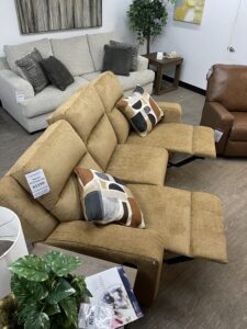 Accent pillows for the Ashley Kanlow sofa featuring bold abstract shapes in espresso, ochre, and terracotta. #forwardfurnitureedmonton #colinthefurniturefella