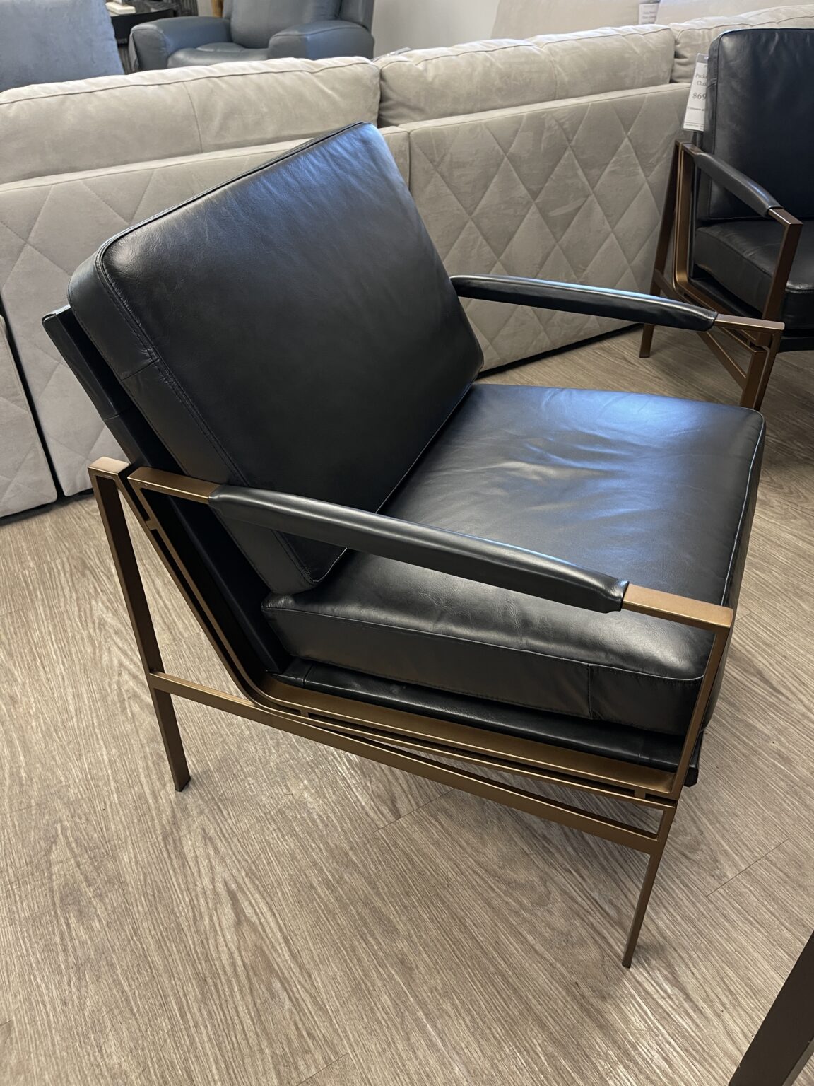 Leather puckman chair by ashley Forward furniture edmonton